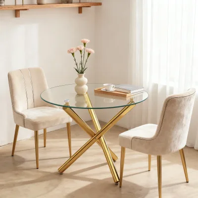 Table ronde en verre trempé à pieds dorés